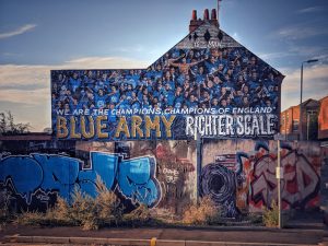 Leicester City mural in the side of a row of terraced houses