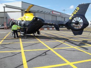 NPAS EC135 helicopter being refuelled at Birmingham Airport